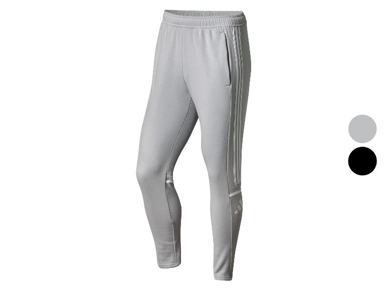 Grijze Adidas trainingsbroek met witte strepen.