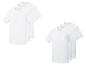 Drie witte T-shirts met ronde hals en drie witte T-shirts met V-hals.