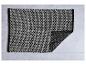 Grijs en zwart badmat met geweven textuur.