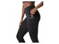 Zwarte sportlegging met zijzak waarin een smartphone zit