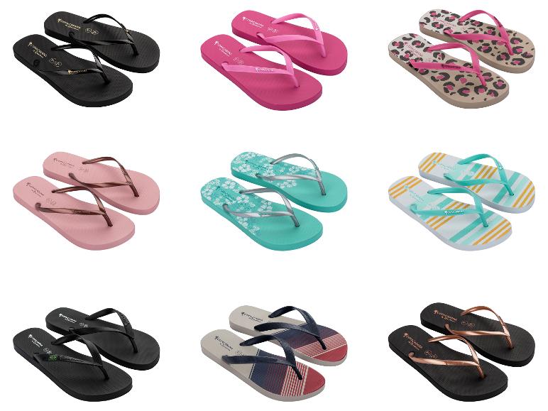 Negen paar teenslippers in diverse kleuren en patronen, waaronder zwart, roze, luipaardprint en gestreept.