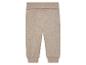 Beige baby joggingbroek van gebreide stof.