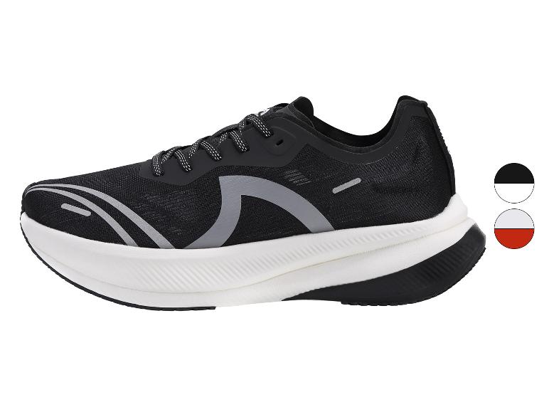 Zwarte sportschoenen met witte zool en grijze details.