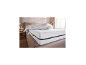 LIVARNO HOME comfortschuimmatras op een bed met een wit dekbed.