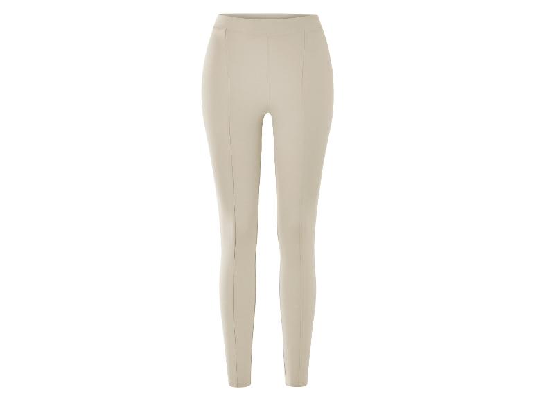 Beige broek met smalle pijpen.