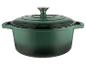 Groene gietijzeren pot met deksel.