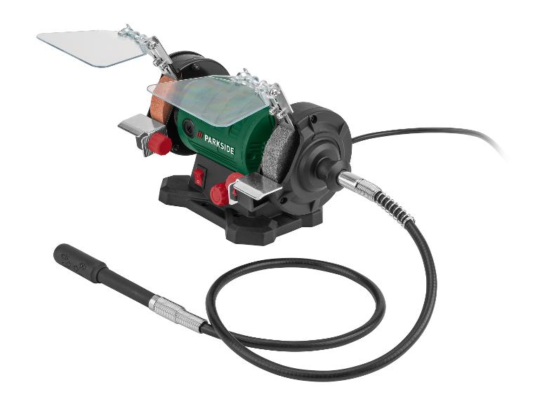 Parkside slijpmachine met accessoires.