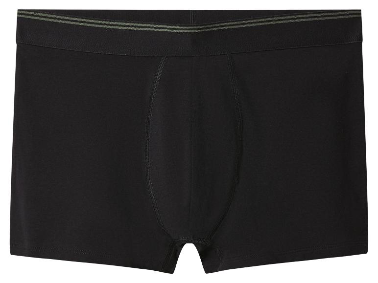 Zwarte herenboxershorts met groene strepen op de tailleband.