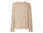 Beige trui met lange mouwen.