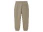 Beige joggingbroek met zak achterop.
