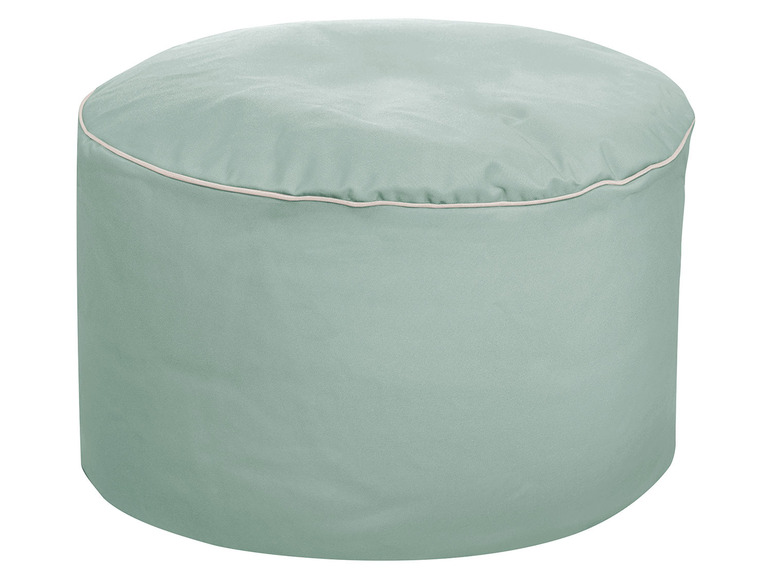 Een ronde, lichtgroene poef met een witte rand.