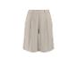 Beige dames culottes met wijde pijpen en plooien.