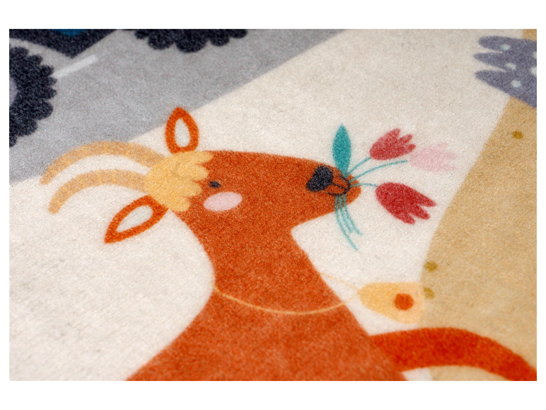 Fluweelachtige stof met geiten- en tulpendesign.