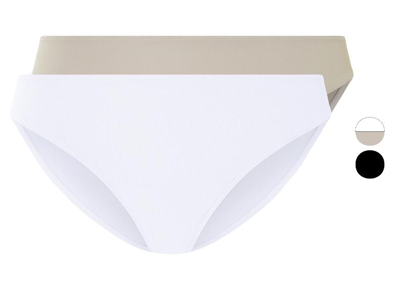 Twee paar ribgebreide slips, wit en beige.