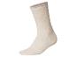 Beige sok met geribbelde boord.