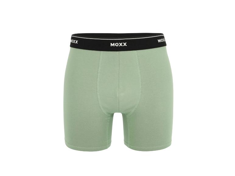 Lichtgroene herenboxershort met een zwarte elastische tailleband.