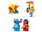 Speelgoedset met twee kleine figuren, een kiosk en een draaiend apparaat.