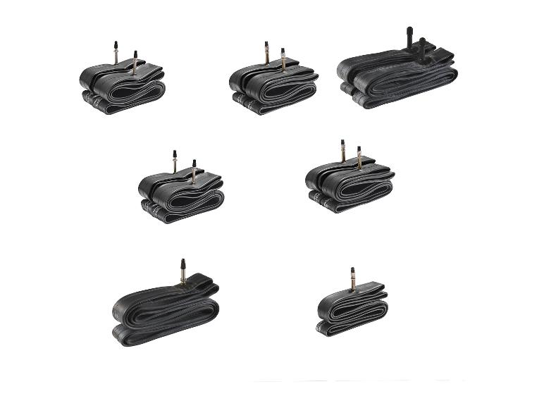 Zeven opgevouwen fietsbinnenbanden met ventielen, sommige met tekst zoals 'in China' en nummers.