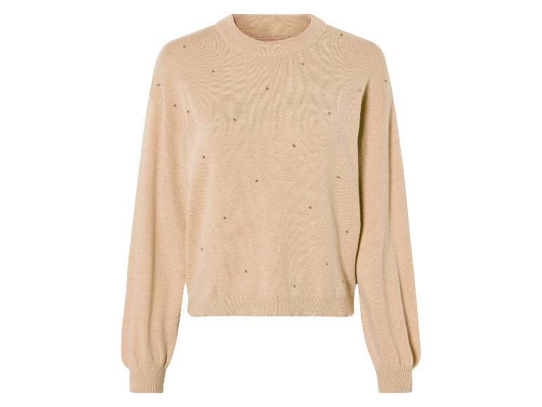 Beige trui met gouden studs.