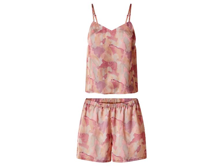 Damespyjama met abstract roze en oranje patroon.
