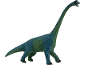 Speelgoed groene brachiosaurus dinosaurus op een witte achtergrond