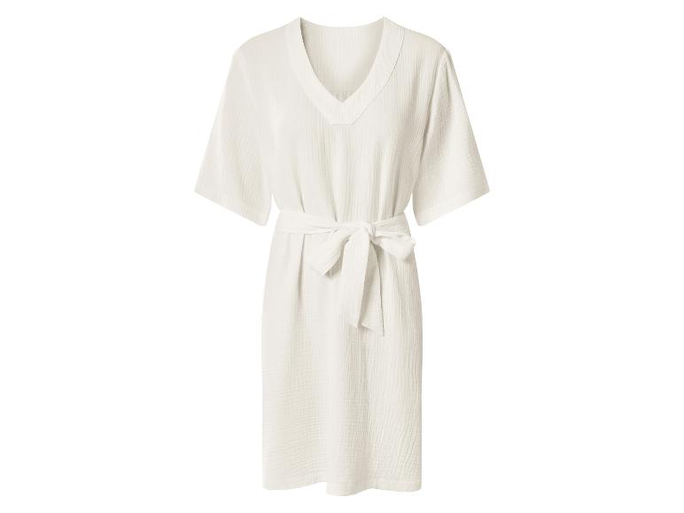 Witte jurk met korte mouwen, V-hals en strikceintuur in de taille.