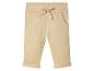 Beige broek met trekkoord en zakken.
