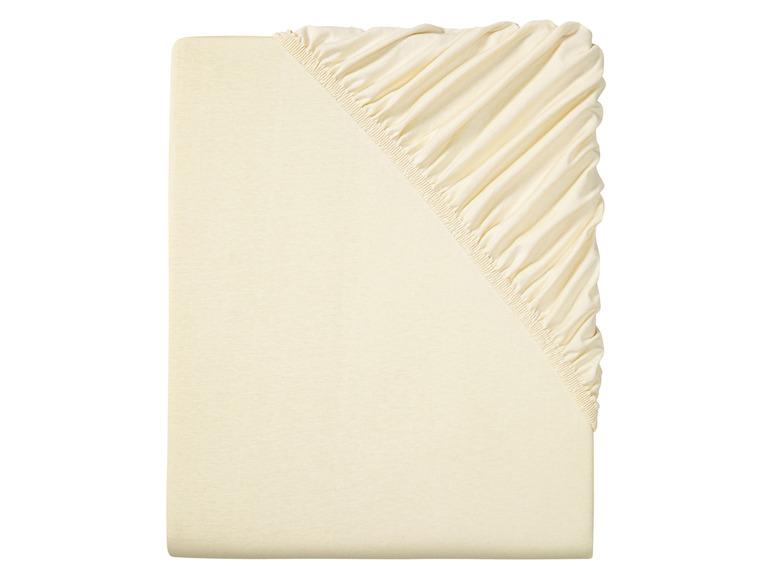 Een beige hoeslaken met elastiek