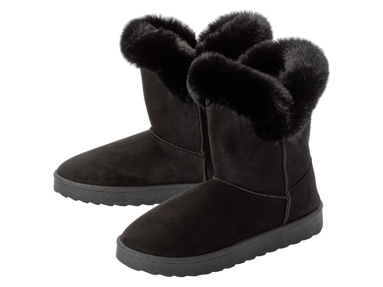 Twee paar zwarte laarzen met bontkraag.