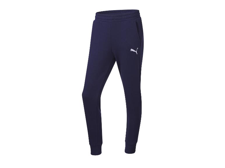 Donkerblauwe trainingsbroek met een Puma-logo.