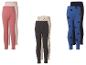 Drie paar kinderleggings: roze met stippen, beige met hartjes en blauw met hartjes.