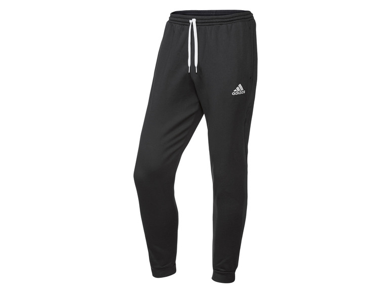 Zwarte Adidas trainingsbroek met witte veters.