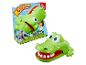 Krokodil met kiespijn-spel van Hasbro, een groene krokodil met open bek en rode tanden.