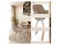 Beige eetkamerstoelen met houten poten en een ronde tafel in een moderne eetkamer.