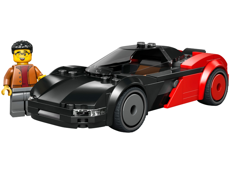 Een zwarte en rode speelgoed sportwagen met een lachend minifiguur ernaast.