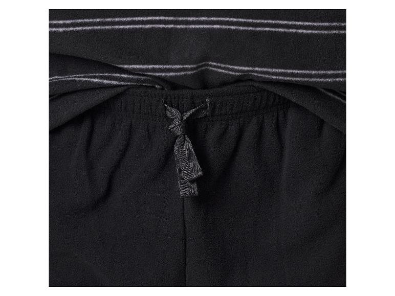 Zwarte fleece pyjamabroek met trekkoord en gestreept shirt