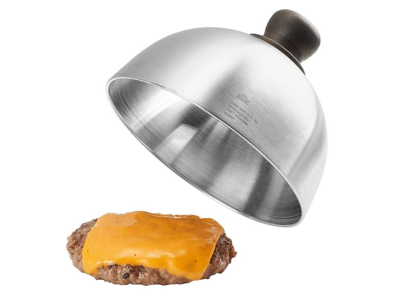 Metalen smeltkap voor kaas op een burger met de tekst „GRILL MEISTER”