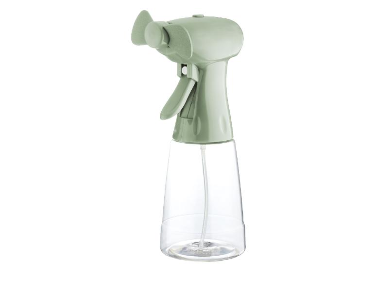 Draagbare spuitfles en ventilator: lichtgroen design.