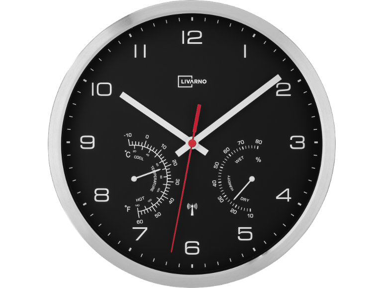 Wandklok met thermometer en hygrometer, zwart met zilveren rand.