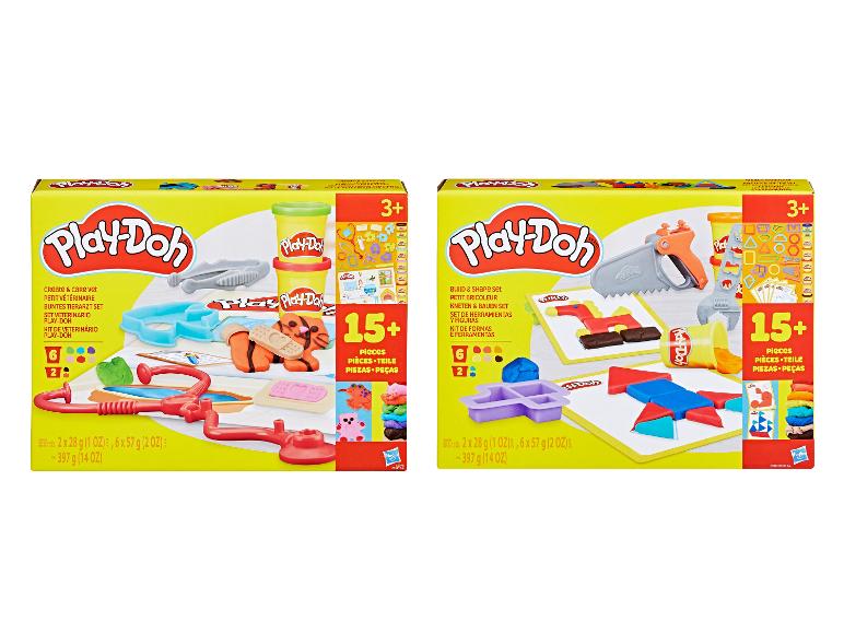 Twee Play-Doh sets: een dierenarts kit met dierenfiguren en een bouw- en vormset met gereedschap.