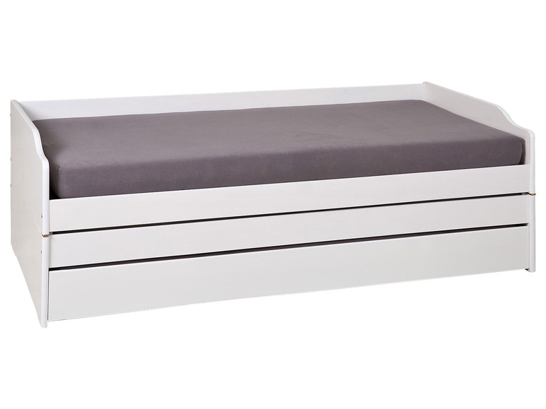 Witte bed met drie laden en een grijs matras.