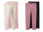 Set van vier kinderleggings: twee roze, één met regenboogprint en één zwarte.