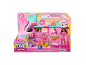 Roze speelgoedcamper met speelfiguren en accessoires in de verpakking.