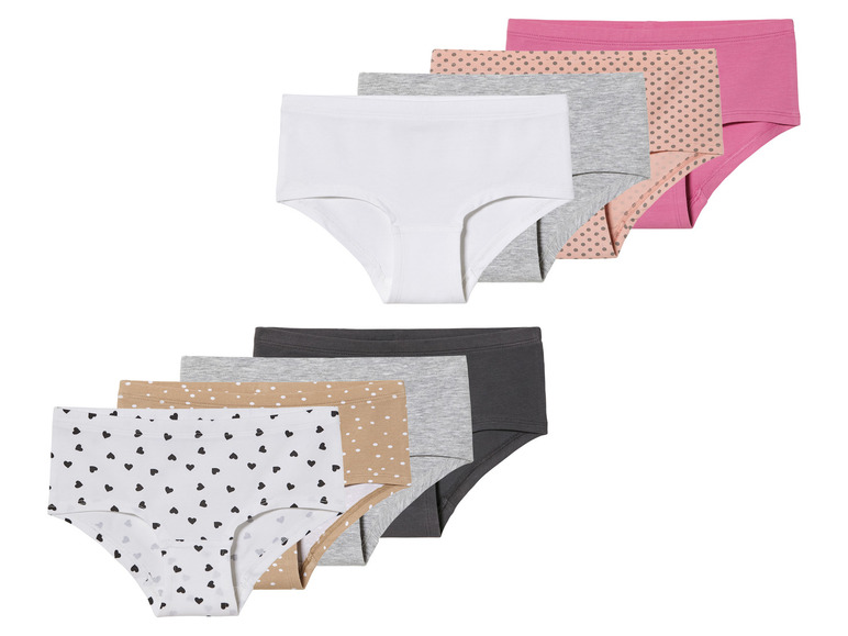 Een set van zes damesonderbroeken met hartjes en stippen.