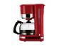 Rood koffiezetapparaat met glazen kan en verlichte aan/uit-knop.