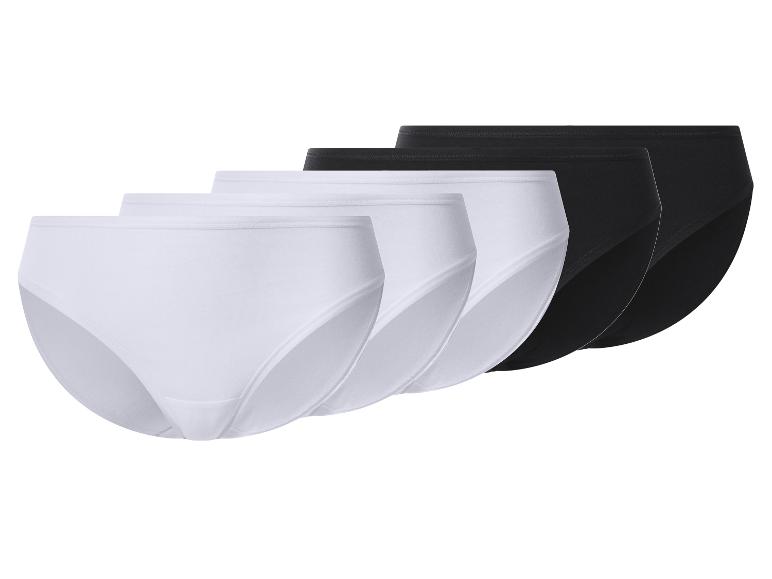 Verpakking met vier slips, twee witte en twee zwarte.
