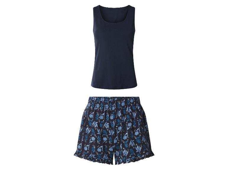 Dames pyjamaset met marineblauw hemdje en bedrukte shorts.