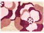 Bloemige badmat met abstract bloemenpatroon in roze, paarse en beige tinten.