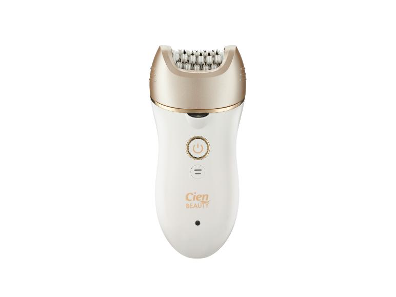 Witte epilator met een champagnekleurige kop en bedieningsknoppen.