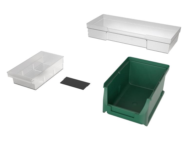 Transparante en groene plastic opbergbakken met een zwarte verdeler.